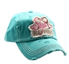 ponytail cap says sip happens with wine glass in front distressed style teal color