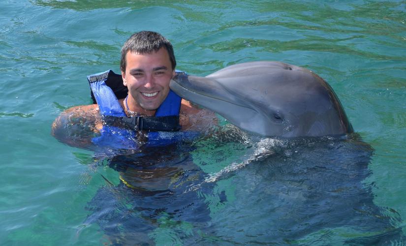 Swim with the Dolphins at Sanctuary Bay in Freeport (Dive In Bar and Grill)