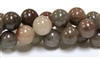 RB584-10mm STONE BEADS IN RAINBOW AUSTRALIAN OPAL