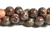 RB614-12mm STONE BEADS IN RED SKIN PANTHER