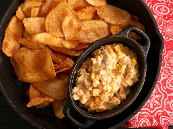 Potato chips with creamy jalapeno corn dip