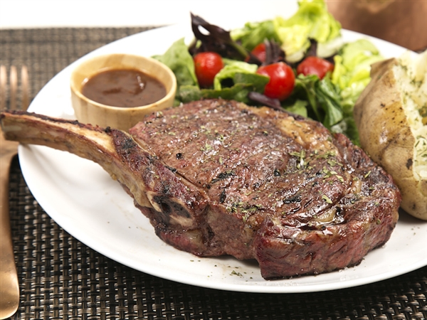 Large top sirloin seasoned with minced herbs, salt and cracked peppercorns