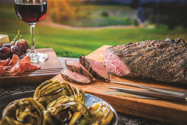 Tri-Tip on a platter alongside artichokes and charcuterie. Photo courtesy Certified Angus Beef LLC