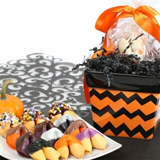 An assortment of spooktacular treats, fruit punch, black raspberry and pumpkin fortune cookies are a ghostly delight.