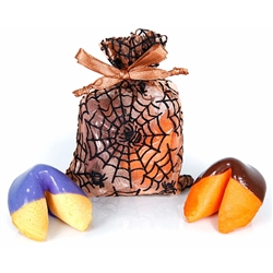 One vanilla fortune cookie dipped in purple chocolate and one orange chocolate covered fortune cookie inside a spooky web organza bag. Each cookie has a Halloween fortune inside.