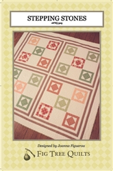A simple quilt, consisting of the traditional "square within a square" block,mad quite stunningby an innovative setting!