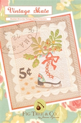 A vintage "stamp" wall hanging complete with an embroidered postmark and a vintage skate