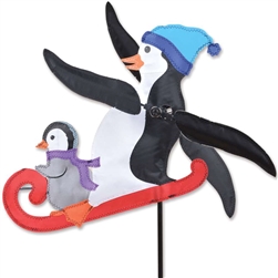 Sledding Whirligig's penguin arms turn in a gentle breeze. All hardware included.