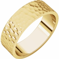 This 14k yellow gold hammered men's wedding band is available in either white, yellow or rose gold.