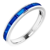 This 14k white gold sapphire stackable ring features natural blue sapphires.
