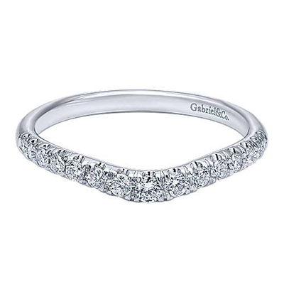 This 14k white gold diamond wedding band is curved.