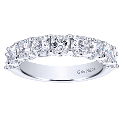 This 9 diamond asshcer cut diamond wedding band sports a sleek and stylish look with 2.34 carats of diamonds doing all the sparkling in this diamond wedding band