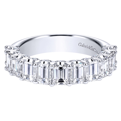 This emerald cut diamond wedding band set in white gold has 2.50 carats of diamonds shining up and down this diamond wedding band.