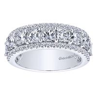 This beautiful and dynamic round and asscher cut diamond band gleams with over 2.50 carats of diamonds set into this 14k white gold diamond wedding band.