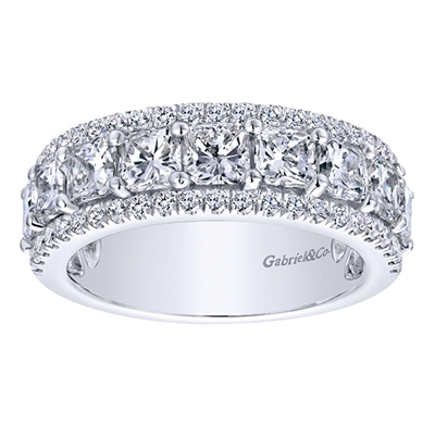 This beautiful and dynamic round and asscher cut diamond band gleams with over 2.50 carats of diamonds set into this 14k white gold diamond wedding band.