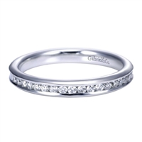 Beautiful round diamonds are set into a 14k white gold channel in this fresh and classic white gold diamond wedding band!