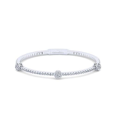 This gorgeous and sophisticated white gold diamond bangle features nearly 1 carat of brilliant round diamonds that sparkle.