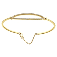 This simple diamond bangle is offered in 14k yellow gold, featuring 0.31 carats of shimmering round diamonds set in a split style, with an oval shape.