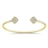 Two center diamond sections create this 14k yellow gold diamond cuff bracelet.