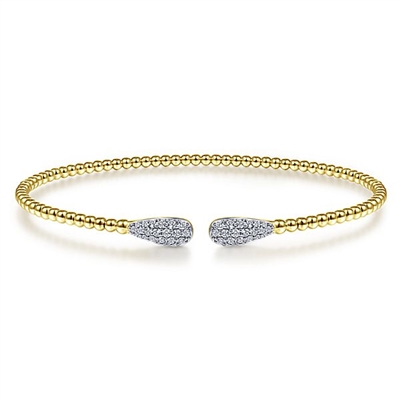 14k yellow gold cable cuff bracelet features two diamond sections.