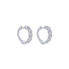 These diamond hoop earrings hug the ear with 0.32 carats of diamonds.