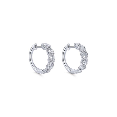 These diamond hoop earrings hug the ear with 0.32 carats of diamonds.