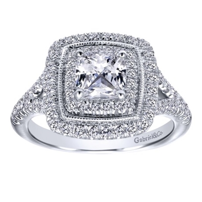 This ornate and pavÃ© set diamond engagement ring snugly wraps around a cushion cut center diamond in this beautiful, unique and complex white gold cushion cut diamond engagement ring.