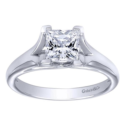 This white gold or platinum engagement ring fits a princess cut diamond and features a split shank, with a classic and traditional solitaire look.