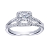 Gorgeous twin rows of white gold and diamonds make their way towards a princess cut diamond halo in this 14k white gold split shank princess halo engagement ring.