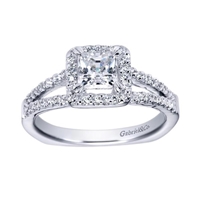 Gorgeous twin rows of white gold and diamonds make their way towards a princess cut diamond halo in this 14k white gold split shank princess halo engagement ring.