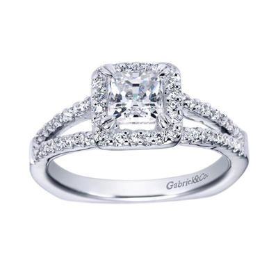 Gorgeous twin rows of white gold and diamonds make their way towards a princess cut diamond halo in this 14k white gold split shank princess halo engagement ring.