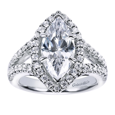 If you're looking for a marquise center diamond, you won't find a better halo engagement ring to surround it with this contemporary marquise halo engagement ring in white gold or platinum.