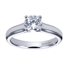 Sometimes a round center diamond just needs to be left alone! With this contemporary solitaire engagement ring will let that round center diamond shine.