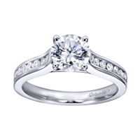 Round brilliant diamonds nestle into a contemporary straight engagement ring in your choice of white gold and platinum.