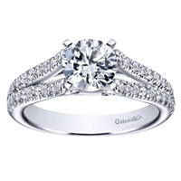 Double diamond rows of round brilliant diamonds crawl their way up this split shank diamond engagement ring, meeting a round center diamond of oyur choice.