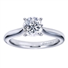 Simplicity at its finest, this smooth band thoughtfully cradles a round center diamond in a sturdy 4 prong setting in this solitaire engagement ring.