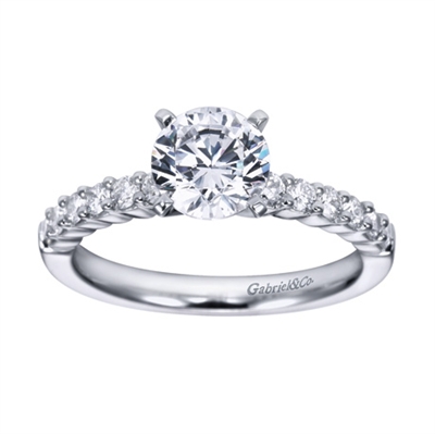 A white gold or platinum setting with round brilliant diamonds is featured in this contemporary straight engagement ring.