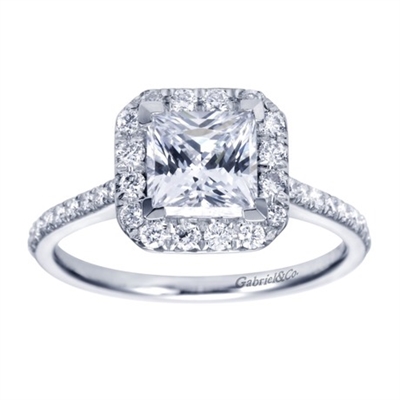 This beautifully crafted diamond halo engagement ring is fit for a princess (and a princess cut diamond!), with over one third carats of diamonds in your choice of metal, made available by Gabriel & Co.