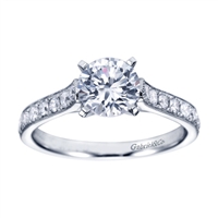 White gold and round diamonds mix spectacularly to form this vintage straight engagement ring available in white gold or platinum, featuring over 1/3 carat in diamonds.