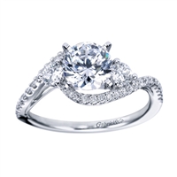 Round brilliant diamonds bedazzle in your choice of white gold or platinum diamonds in this contemporary 3 stone style engagement ring.
