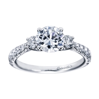 Blending round brilliant diamonds with your choice of white gold or platinum, this 3 stone contemporary engagement ring is an excellent pick.