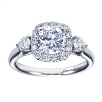 A Gabriel & Co. designer engagement ring that is very unique, this white gold 3 stone style halo engagement ring is sparkling with a half carat of round brilliant diamonds, including two larger side diamonds that really steal the show.