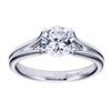 A white gold solitaire engagement ring with a contemporary twist! Designed by Gabriel & Co.