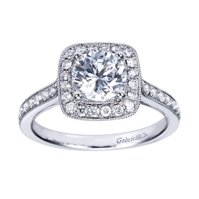 A Round center diamond floats spectacularly in the midst of 1/2 carat of round brilliant diamonds in this vintage inspired halo engagement ring.