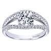 This uniquely style diamond engagement ring with a split shank band features over one half carats of round brilliant diamonds!