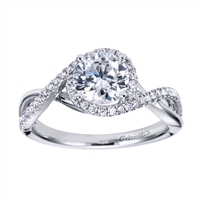 This unique diamond engagement ring fits a round center diamond and shimmers with one quarter carats of round brilliant diamonds that wrap around beautiful and sleek white gold or platinum.