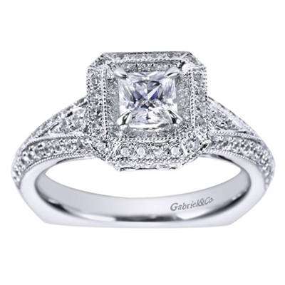 In your choice of white gold or platinum, this victorian halo engagement ring  brings back memories of royalty and decadence with 1.11 carats of brilliant diamond shine and a center diamond included.