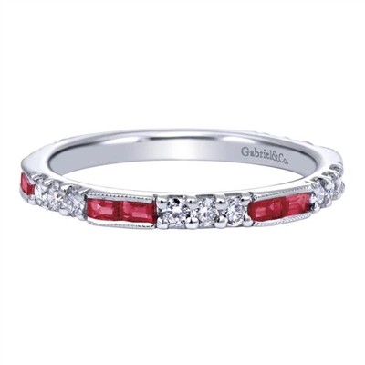 This 14k white gold diamond and ruby stackable ring has 0.39 carats of round brilliant diamonds and 1/3 carats in baguette shape rubies.