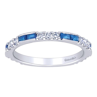 Sapphires line up with diamonds over 14k white gold in this sapphire and diamond stackable ring featuring one third carats in sapphire and almost one half carats in round diamonds.