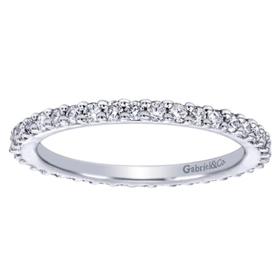 This well crafted 14k white gold diamond band stackable ring is a perfect compliment to a more intricate stackable ring.